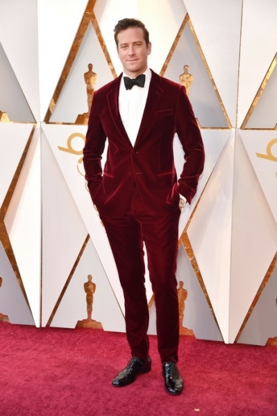 Armie Hammer in a burgundy velvet suit by Giorgio Armani Image