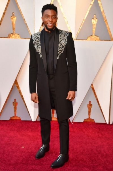 Chadwick Boseman, star of Black Panther, in an all-black Givenchy Haute Couture outfit Image