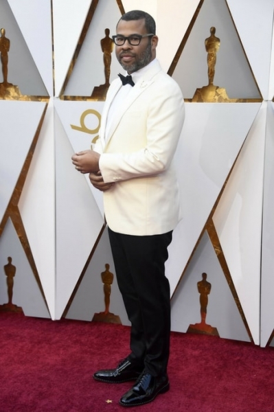 Jordan Peele, winner of Best Original Screenplay, in Calvin Klein Image