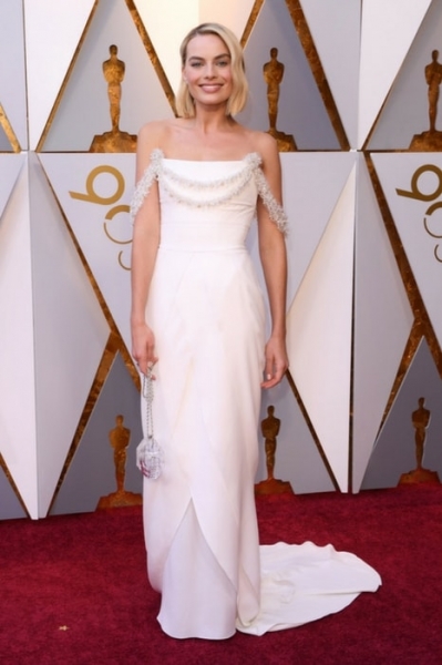 Robbie Margot, nominee for Best Actress, in a pristine white Chanel dress Image