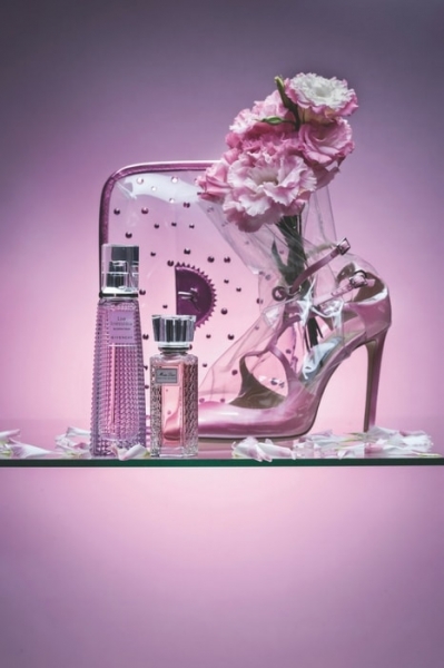From-left-Live-Irrésistible-Blossom-Crush-Eau-de-Toilette-by-Givenchy-Miss-Dior-Absolutely-Blooming-roller-pearl-Cassidy-clutch-by-Giuseppe-Zanotti-Clarie-100-pump-by-Off-white-care-of-Jimmy-Choo Image