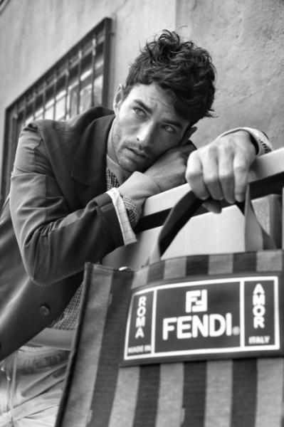 Attire by Prada and Hermès; Shopping bag by Fendi Image