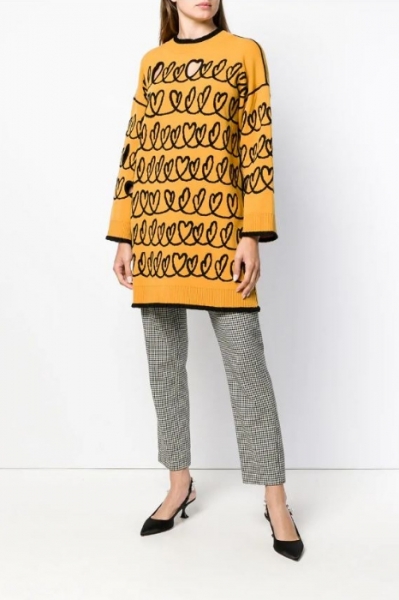 This yellow wool blend maxi knit sweater from Fendi is inspired by the 'Open your Heart' theme Image