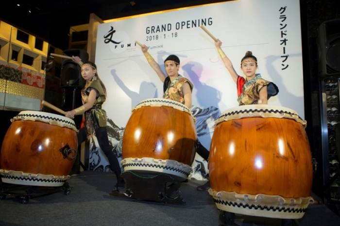A trio of drummers welcomed guests to the grand opening party of FUMI Image