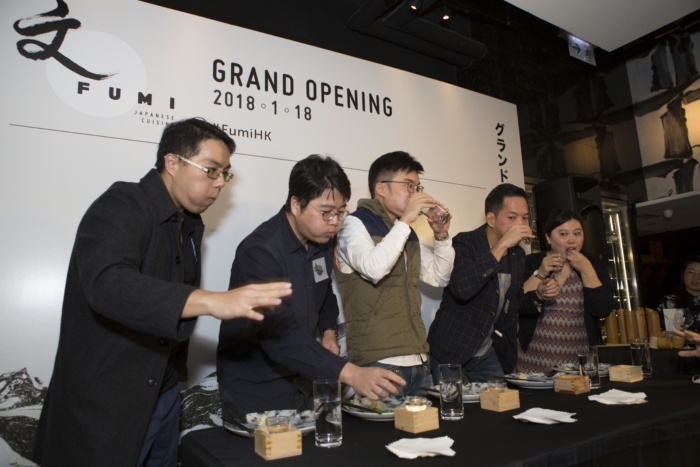 Hungry guests at Fumi’s grand opening party took part in a short game of competitive eating. How quickly can you eat six pieces of sushi Image