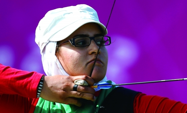 LONDON, ENGLAND - SEPTEMBER 04: Zahra Nemati of the Islamic Republic of Iran competes in her Women's Individual Recurve - W2 class Gold medal match against Elisabetta Mijno of Italy on day 6 of the London 2012 Paralympic Games at The Royal Artillery Barracks on September 4, 2012 in London, England. (Photo by Harry Engels/Getty Images)