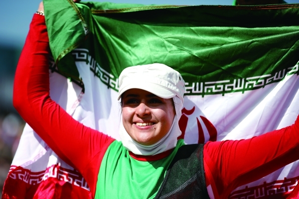 LONDON, ENGLAND - SEPTEMBER 04: Zahra Nemati of the Islamic Republic of Iran celebrates winning her Women's Individual Recurve - W2 class Gold medal match against Elisabetta Mijno of Italy on day 6 of the London 2012 Paralympic Games at The Royal Artillery Barracks on September 4, 2012 in London, England. (Photo by Harry Engels/Getty Images)