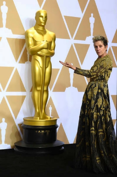 Best Actress winner Frances McDormand wore a shimmering gold-on-black gown