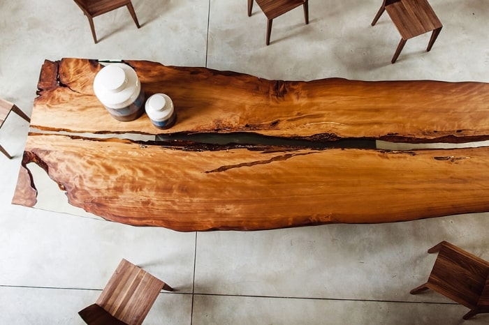 A Kauri Beam table by Riva 1920 crafted from an ancient piece of fossilised Kauri tree
