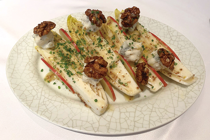 Language of Love No longer a petite maison, LPM Restaurant and Bar shows its maturity in fine, flavoursome, fuss-free French dining Endive Salad with Gorgonzola and Caramelised Walnuts