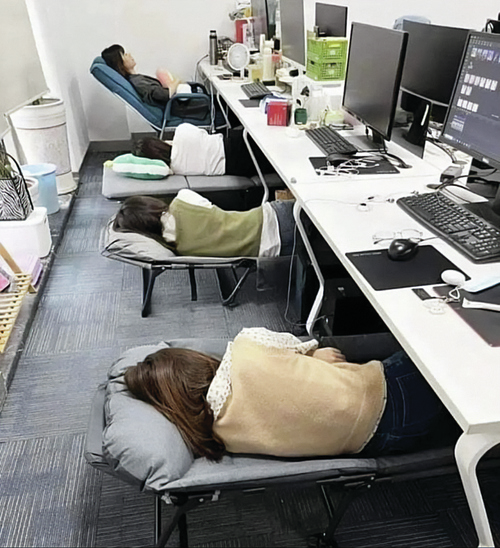 Napping on the job? Pillows to help workers snooze at desk draw