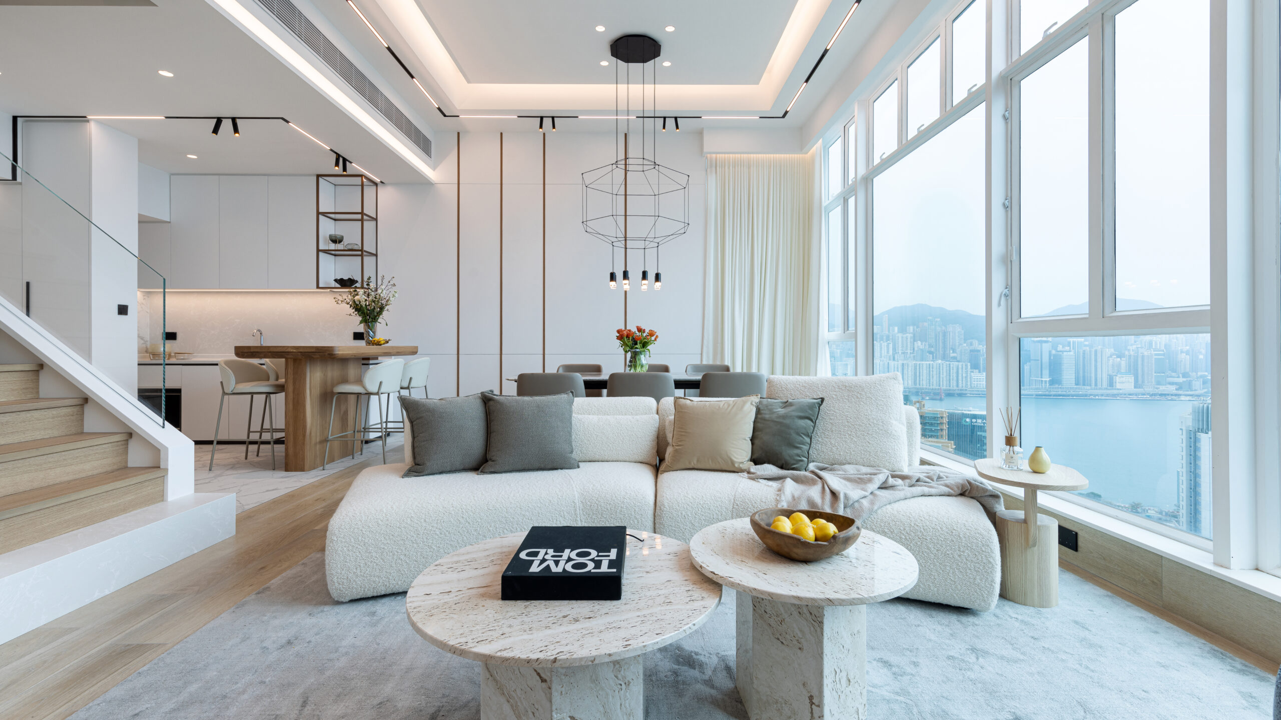 Seamless Serenity: Open concept, dual layers, expansive views – this redesigned Kowloon peninsula penthouse is top draw